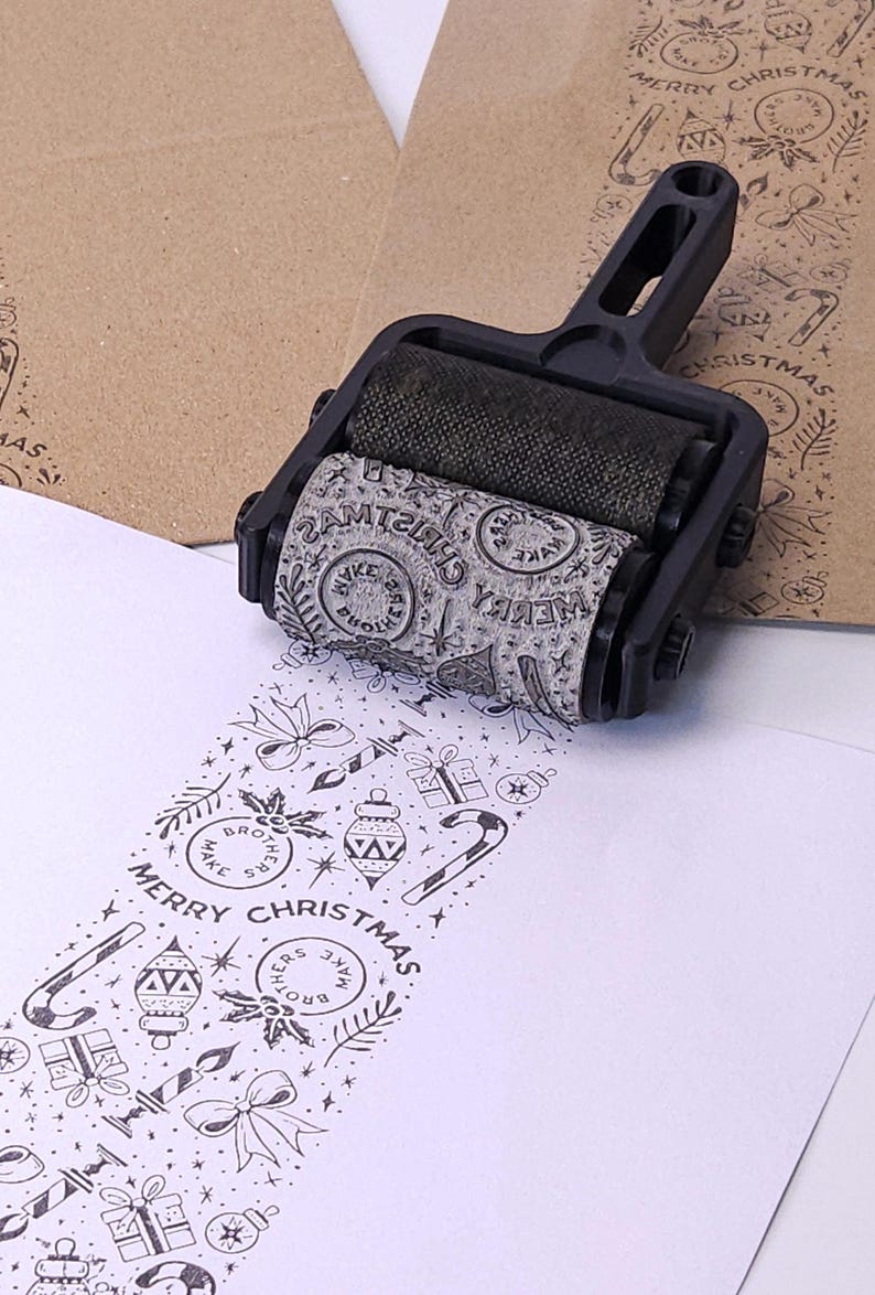 il_794xN.7373833521_hb7f.jpg Custom Logo Roller Stamp - Image 1