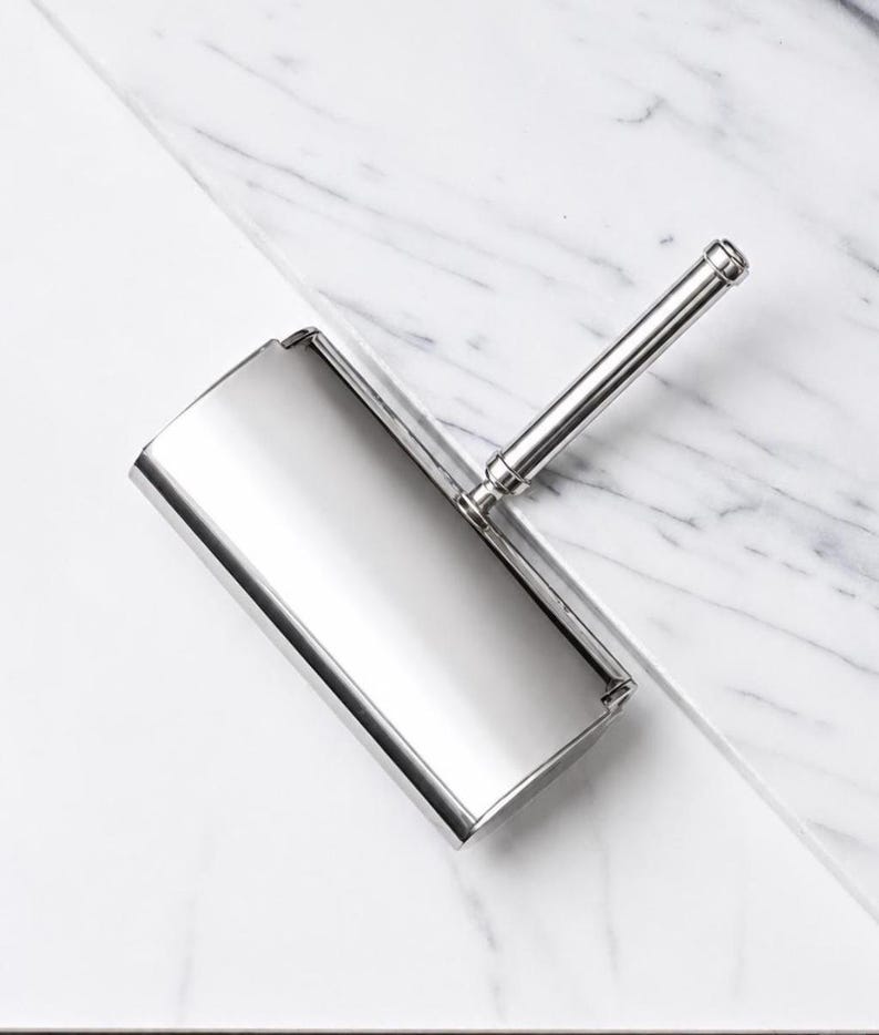 il_794xN.8304556949_orp4.jpg Vintage Silver Lint Roller - Image 1